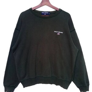 Vintage Ralph Lauren Polo Sport Sweatshirt,Size L,Faded Green Colour,Long Sleeve,Pull Over,Round Neck,Have Little Hole At Neck.