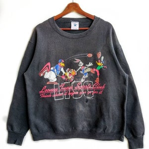 Felpa vintage Looney Tunes Sports Club, taglia L, colore nero sbiadito, squadra del film Space Jam, 90° anniversario, ufficiale Warner Bros, aspetto vintage.