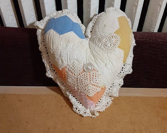 Vintage quilted pillow, heart-shaped farmhouse style stuffed pillow made with lace doilies, old quilt pieces and buttons
