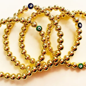 Gold Bracelet: with evil eye