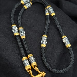 Handmade leather lace with 925 silver  gilded inserts and carabiner lock