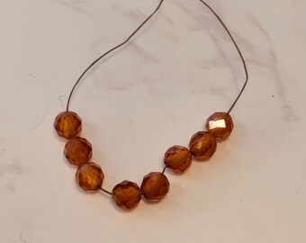 Hessonite Garnet Round Micro-faceted Loose Gemstones. 2.5mm Stones. Mental Clarity, Dispels Fear, Enables Confidence. HG003