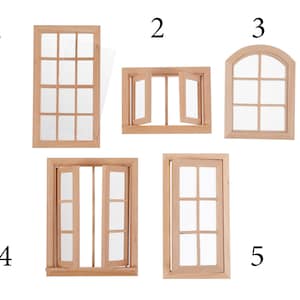 May include: Five different styles of miniature wooden windows, each with a different design. The windows are all made of unfinished wood and have clear glass panes. The windows are numbered 1 through 5.
