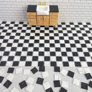 May include: Black and white checkered floor tiles with a white porcelain sink and wooden cabinet in the background. Some tiles are loose and scattered on the floor.