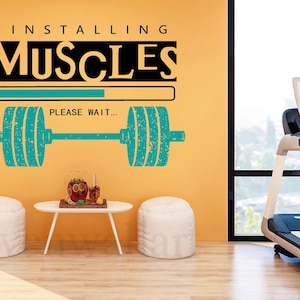 Installing Muscles Gym Wall Decal: Sports Inspiration Decor