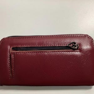 Cartera clásica con cremallera