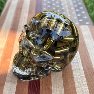 Handmade Resin Skull with 9mm Bullet Casings | Epoxy Skull Art | Gun-Themed Decor | Man Cave Gift | Military Decor | Gothic Skull Sculpture