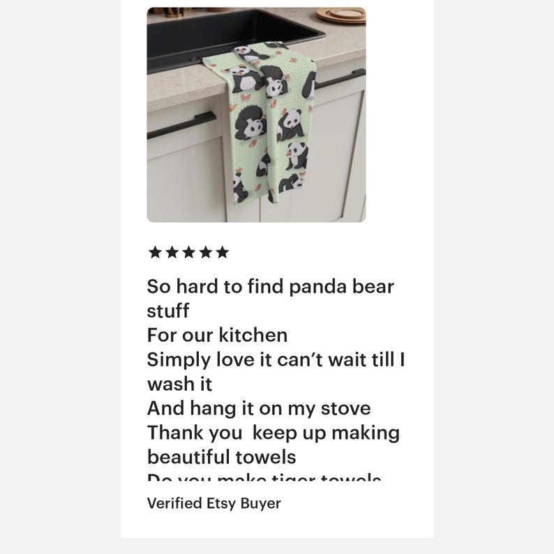 May include: A green kitchen towel with a repeating pattern of black and white panda bears. The towel is hanging on a kitchen cabinet handle. The text "So hard to find panda bear stuff" is written below the image.