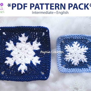 May include: Two crocheted snowflake squares, one in blue and white, the other in blue, light blue, and white. The squares are on a white fluffy surface. The text "*PDF PATTERN PACK*" and "Intermediate - English" is visible above the squares.