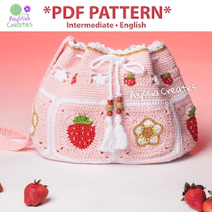 May include: A pink crochet drawstring bag with a white strap, featuring strawberry and flower motifs. The bag has a white tassel and wooden beads. *PDF PATTERN* Intermediate - English
