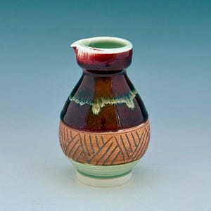 Porcelain Sake Bottle with Copper red and Celadon Glazes made by Hsin-Chuen Lin