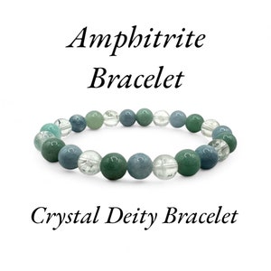 May include: Amphrite Bracelet, a crystal deity bracelet with green, blue, and clear beads.