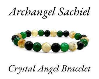 May include: A green, black, and gold beaded bracelet with the text "Archangel Sachiel" and "Crystal Angel Bracelet".