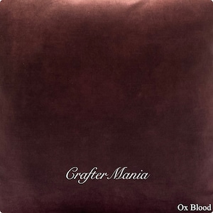 May include: A deep burgundy velvet fabric swatch with the text "Crafter Mania" and "Ox Blood" printed on it.