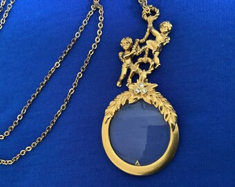 vintage avon magnifying glass necklace