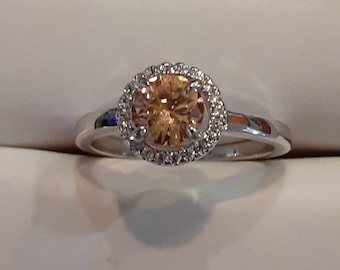 Gorgeous, brilliant morganite ring, approximately 1 carat weight, set with halo of diamond like stones, silver tone band, size US 7