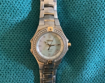 Authentic Seiko Ladies  Coutura Diamond watch. 165.00, model 7N82