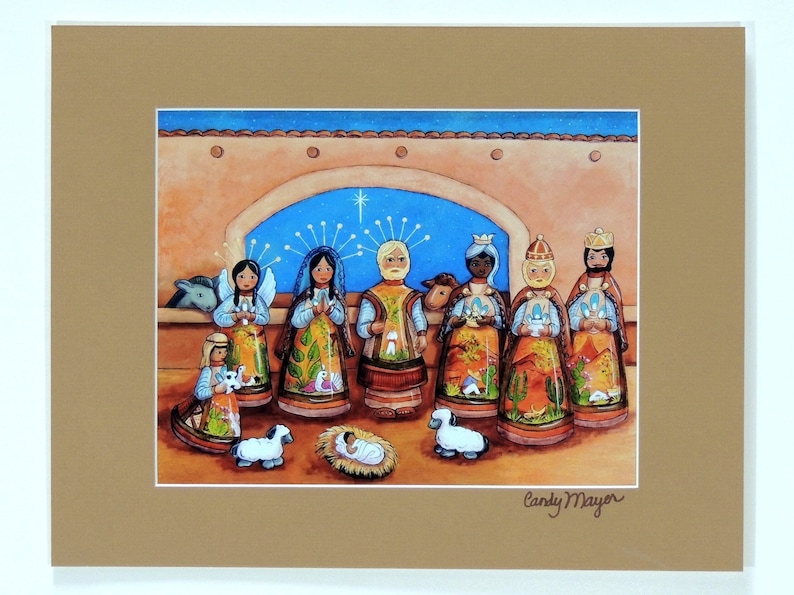 May include: A colorful illustration of a nativity scene with figures of angels, the three wise men, and baby Jesus. The artwork features a star, sheep, and a donkey, all set against a desert backdrop. Signed "Candy Mayor".