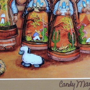 May include: Watercolor painting depicting a nativity scene with figures in traditional attire. The figures have detailed painted scenes within their garments. A white lamb and a baby in a manger are in the foreground. The artist's signature is in the bottom right corner.
