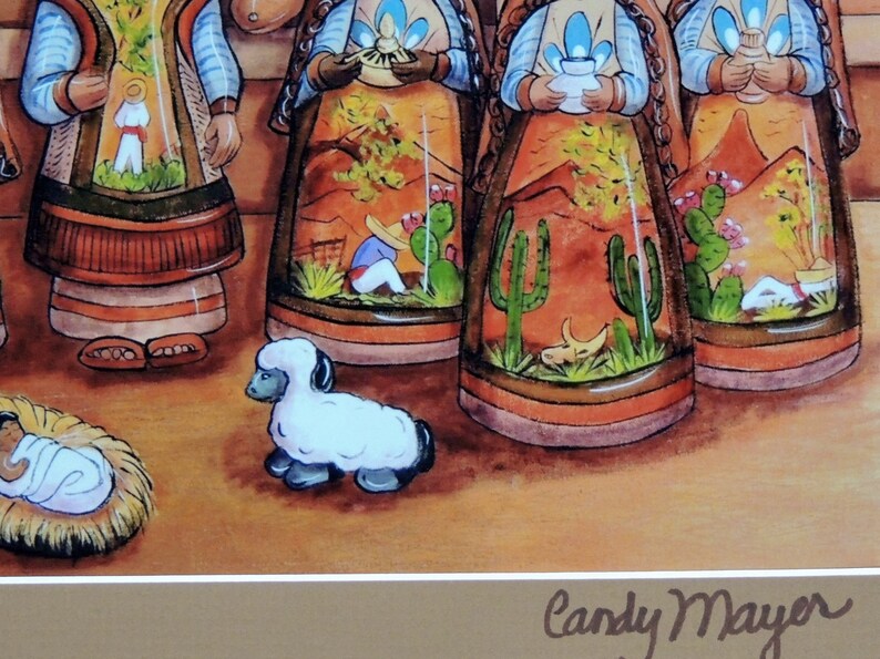 May include: Watercolor painting depicting a nativity scene with figures in traditional attire. The figures have detailed painted scenes within their garments. A white lamb and a baby in a manger are in the foreground. The artist's signature is in the bottom right corner.
