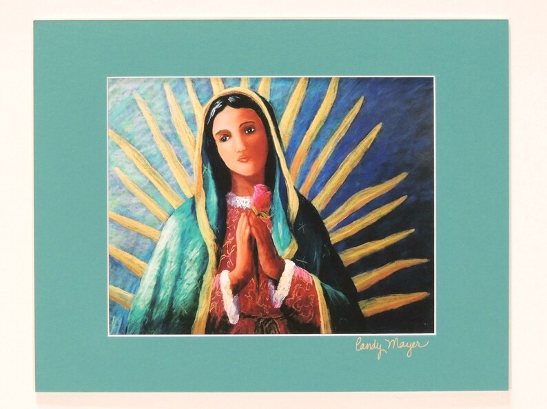 May include: A painting of the Virgin Mary, depicted wearing a blue and green robe, holding a pink rose in her right hand. She is surrounded by a golden halo of light rays. The painting is signed "Candy Mayer" in the bottom right corner.