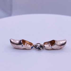 Silver Pair of Wooden Shoes