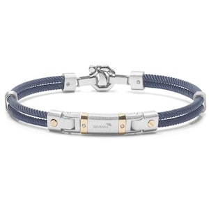May include: A navy blue bracelet with a silver clasp and accents. The bracelet features a woven rope design and gold-colored details. The word "BARAKA" is visible on the central silver piece. A stylish accessory.