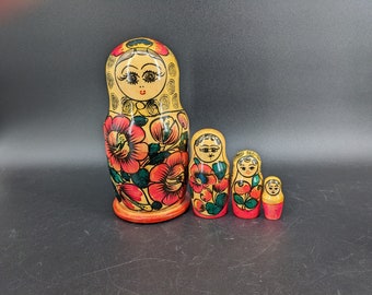 Vintage 7 1/4''  Wooden Russian Nesting Dolls Set of 4, one is missing top