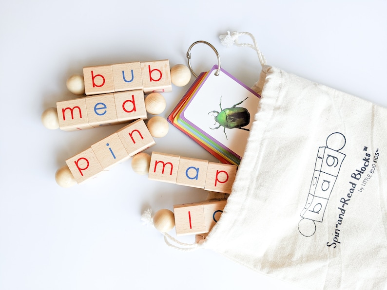 Little Bud Kids Spin-and-Read Montessori phonetic reading blocks with matching CVC flashcards for phonics learning for beginner readers. Comes with a tote bag which makes this a great educational travel toy.