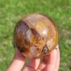 Beautiful golden healer quartz sphere/palm stone/crystal of new beginnings/transformation/balance/all chakras/master healer