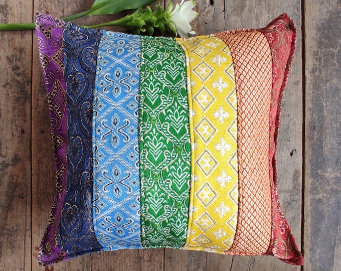 Rainbow, multi-pattern cushion cover with golden shine made to brighten up a room and bring more color, texture and light into your space.