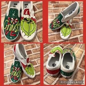 May include: Four images of custom-painted Vans slip-on shoes. The shoes feature a Grinch design with a green face, red and white Santa hat, and the word "Grinch" on the side. The shoes have a white sole and are decorated with Christmas-themed patterns.