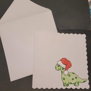 Biglietto di Natale con dinosauro, biglietto di Natale con dinosauro dipinto a mano con acquerello e cappello di Babbo Natale (dipinto originale fatto a mano)
