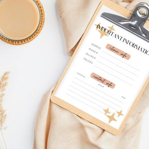 May include: A clipboard with the words "IMPORTANT INFORMATION" in black script. The clipboard has a silver clip and a white paper with lines for information. The paper includes sections for "clinic info" and "contact info". A glass of coffee and dried plants are also in the image.