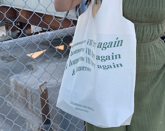 celebrate the small tote, graphic design tote bag, quote tote bag, urban aesthetic, two-strap canvas tote