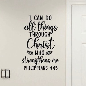 May include: Black and white wall decal with the quote "I can do all things through Christ who strengthens me Philippians 4:13".