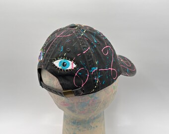 Mad Splatter - Black Hat with Purple + Blue Eyes