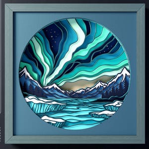 Puede incluir: Una obra de arte en papel enmarcada que representa una aurora boreal. La obra de arte presenta capas de papel azul, turquesa y blanco, creando un efecto 3D de montañas, agua y cielo nocturno. El marco es de color azul apagado y la obra de arte está etiquetada con opciones de tipo de archivo.