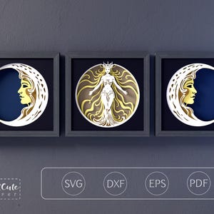 May include: Three framed paper art pieces. Two feature a crescent moon with a woman's profile in gold and white against a dark blue background. The central piece depicts a woman with flowing hair and a crown, in gold and white.