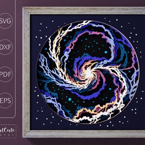 May include: A framed digital art print of a swirling galaxy with pink, blue, and white colors on a dark blue background with white dots. The frame is light brown wood.