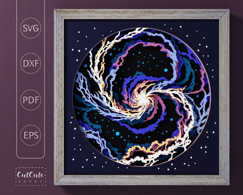 May include: A framed digital art print of a swirling galaxy with pink, blue, and white colors on a dark blue background with white dots. The frame is light brown wood.