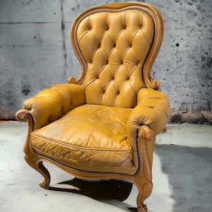 Vintage button back leather Armchair. Home decor Free delivery