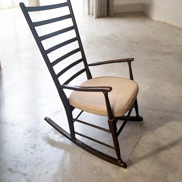 Mid century Scandinavian rocking chair newly upholstered. Delivery included