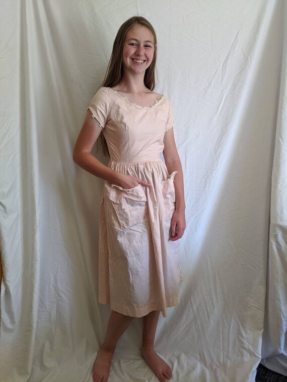 Vintage 50s pink a-line dress with picot trim and