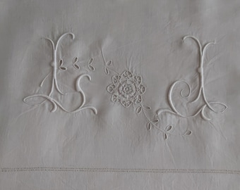 An extra wide antique French pure linen sheet with hand embroidered with monogram LJ,  lace incrustations and fine drawn threadwork. As new