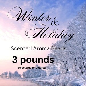 May include: Image features the text "Winter & Holiday" above "Scented Aroma Beads". The text "3 pounds" is below, with "Uncolored or Colored" underneath. The background shows a winter landscape with snow-covered trees and a pink and blue sky.