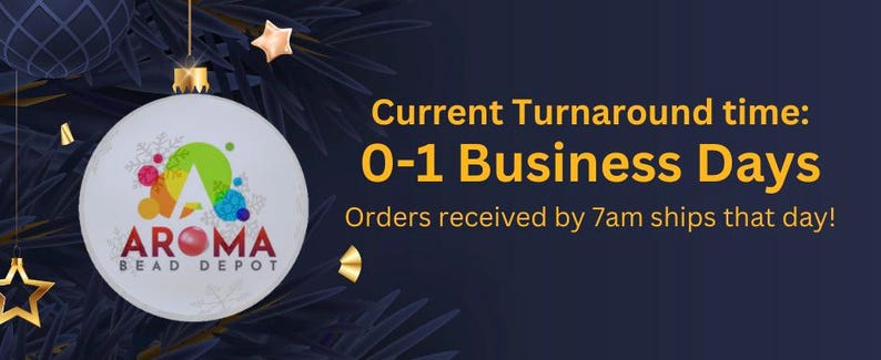 May include: A Christmas ornament with a red, white, and blue design featuring the text "AROMA BEAD DEPOT". The ornament is hanging on a green Christmas tree. The text "Current Turnaround time: 0-1 Business Days Orders received by 7am ships that day!" is displayed on a dark blue background.