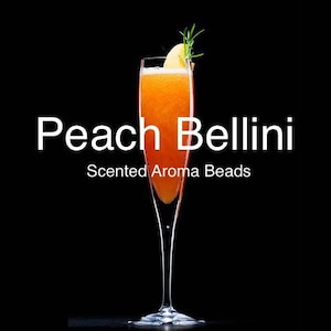 May include: A glass of peach Bellini, a popular Italian cocktail, with a sprig of rosemary. The drink is a light orange color and is garnished with a peach slice. The text "Peach Bellini" and "Scented Aroma Beads" is displayed below the glass.
