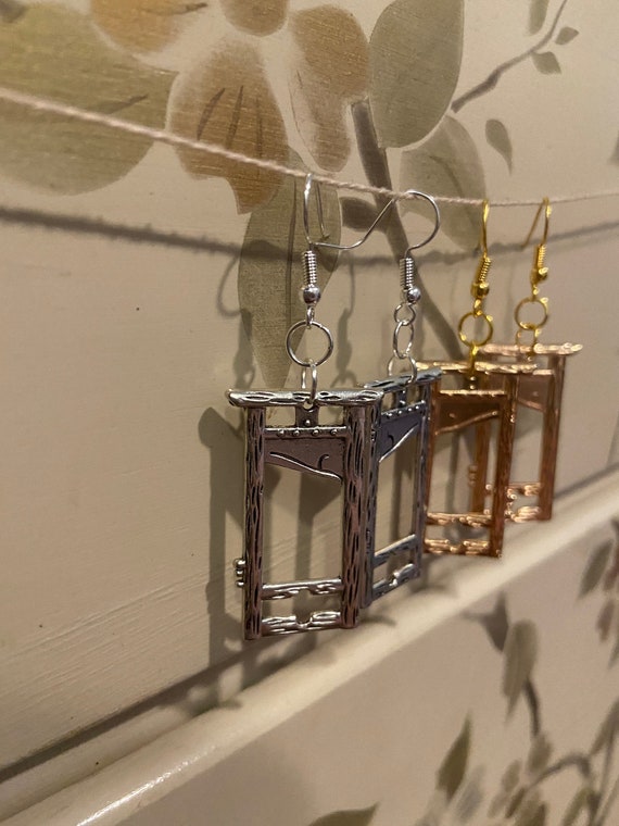 Guillotine earrings from the Reign of Terror