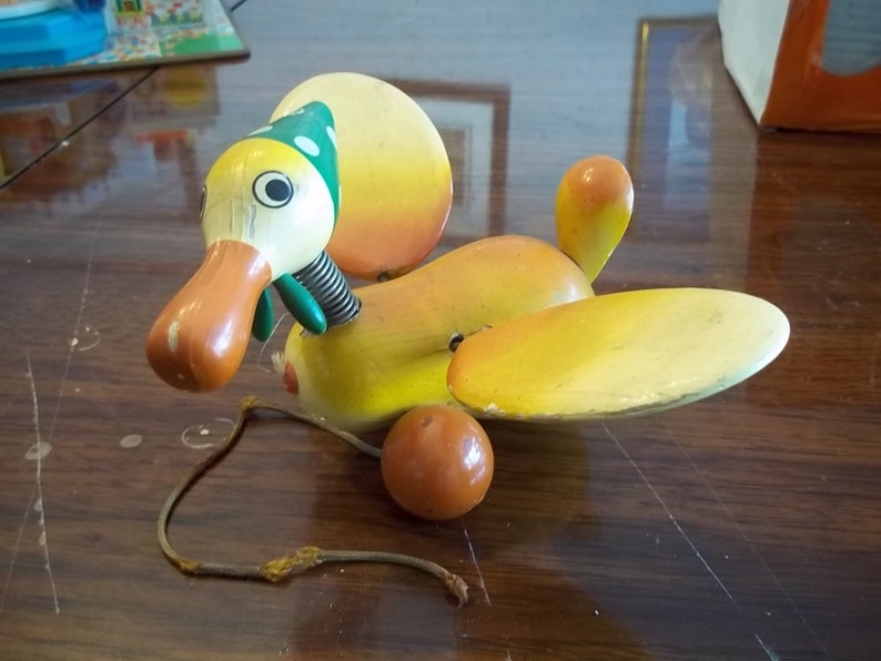 Vintage wooden duck pull toy with moving wings and bobbing Etsy
